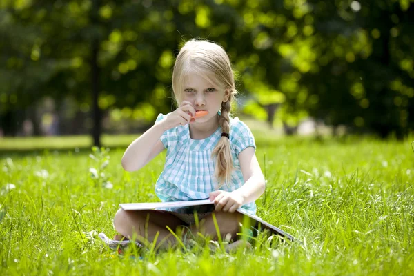 Portrait of a beautiful blonde little girl three years — Stock Photo, Image