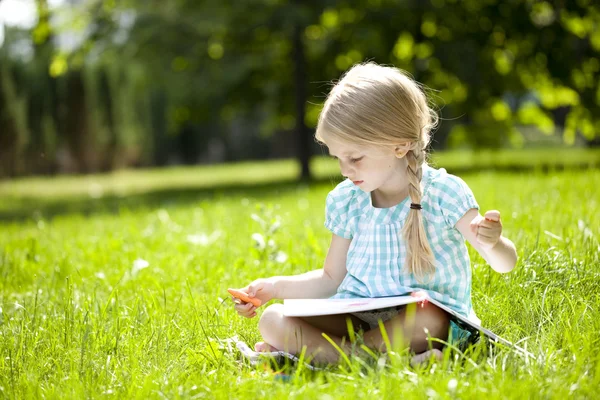 Portrait of a beautiful blonde little girl three years — Stock Photo, Image