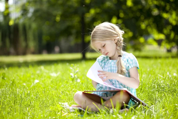 Portrait of a beautiful blonde little girl three years — Stock Photo, Image