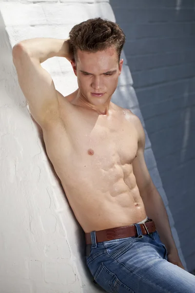 Beautiful muscular male model — Stock Photo, Image
