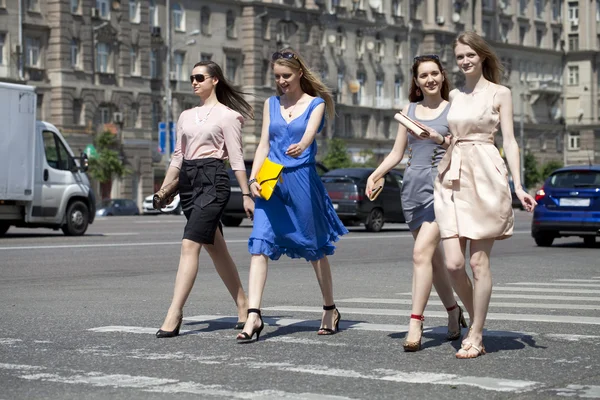 https://st.depositphotos.com/1000824/4779/i/450/depositphotos_47794641-stock-photo-four-beautiful-fashion-girls-walking.jpg