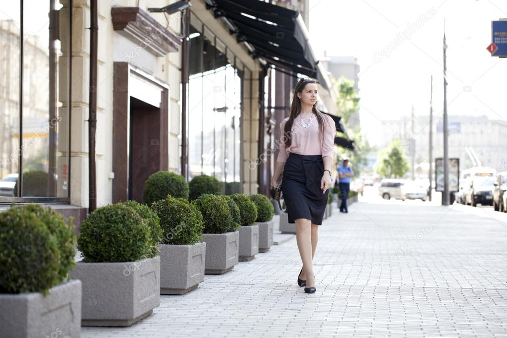 Young woman walking on the street