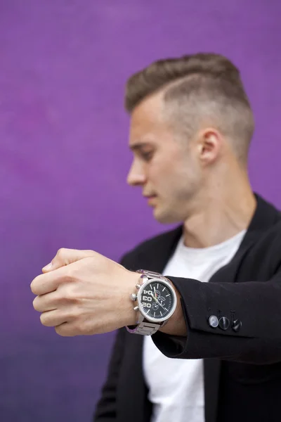 Wrist watches for men in the foreground