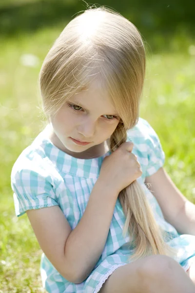 Portrait of a beautiful blonde little girl three years — Stock Photo, Image