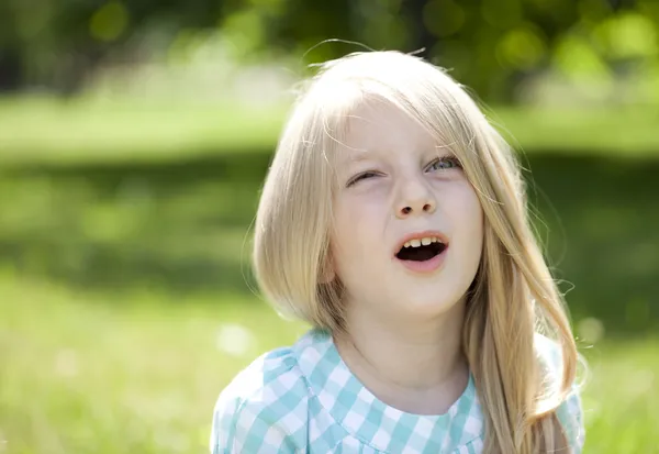 Portrait of a beautiful blonde little girl three years — Stock Photo, Image