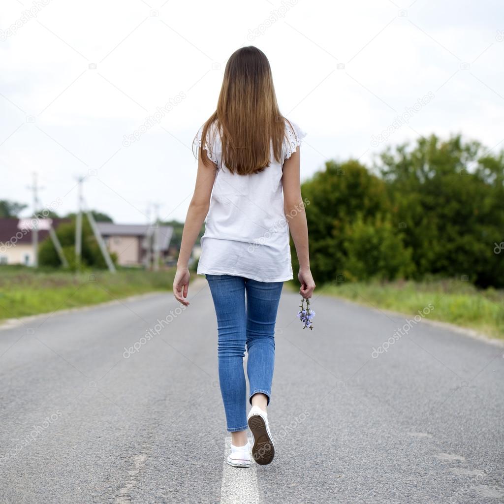 Young woman walking outdoor