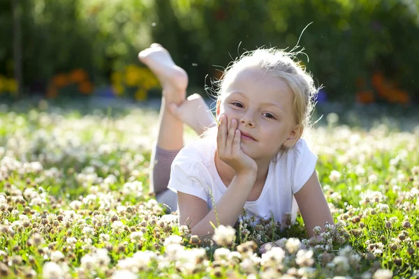 Little happy girl in summer park — Stock Photo, Image