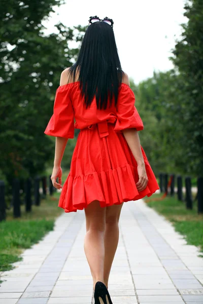 Beautiful woman in red dress — Stock Photo, Image