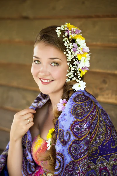 Beauty woman in the national patterned scarf — Stock Photo, Image