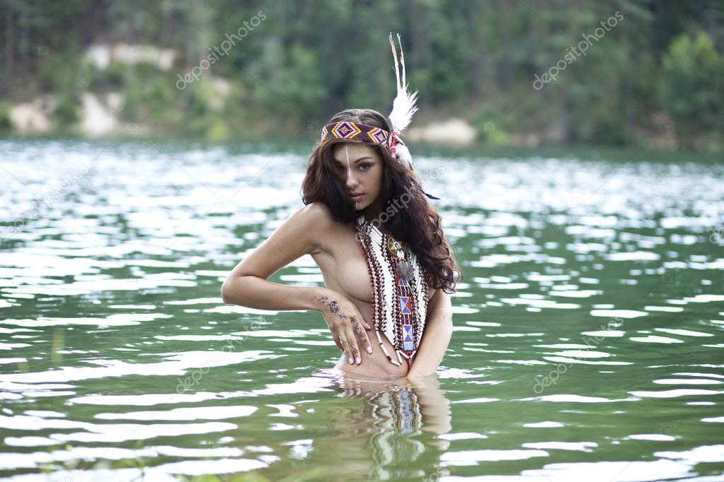 Young woman in costume of American Indian