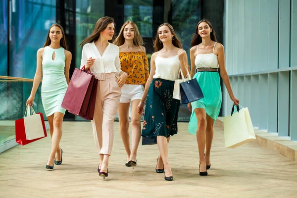 Happy Young Girlfriends Walking Mall Shopping — Stock Photo, Image
