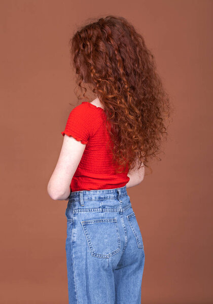 Close up portrait of a young beautiful red hair girl