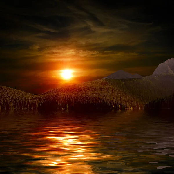 Siyah lake ve mountians tarafından yakın çim — Stok fotoğraf