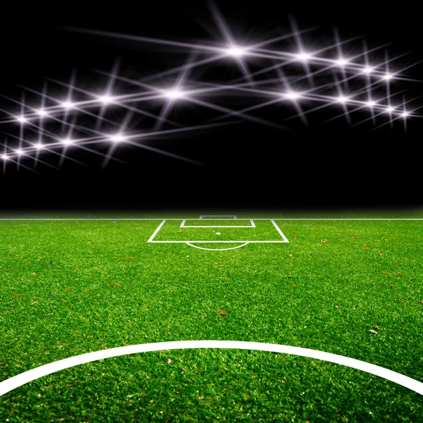 Футбольное поле со светом — стоковое фото