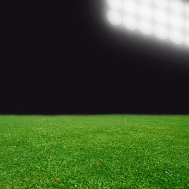 futbol sahası ile parlak ışıklar