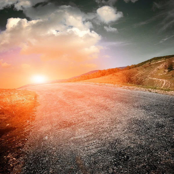 Asphalt road with mountians — Stock Photo, Image