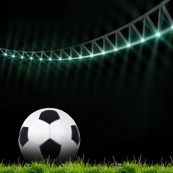 Voetbalveld met felle lichten — Stockfoto