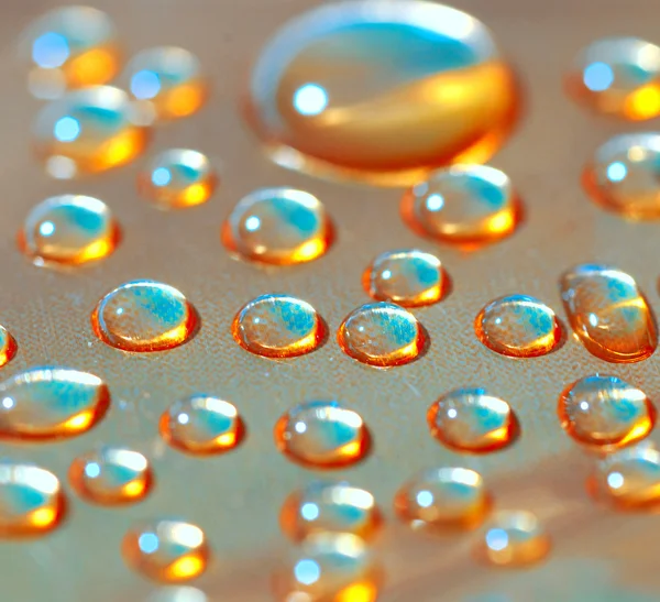 Gotas de agua amarillas — Foto de Stock