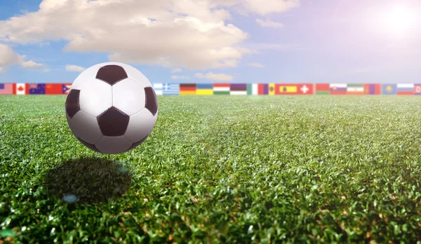 Fotbollsarena med flaggor och ljus — Stockfoto