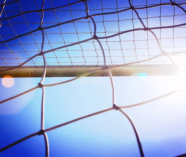 The soccer net with sun — Stock Photo, Image