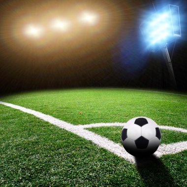 Parlak ışıkları olan futbol stadyumu