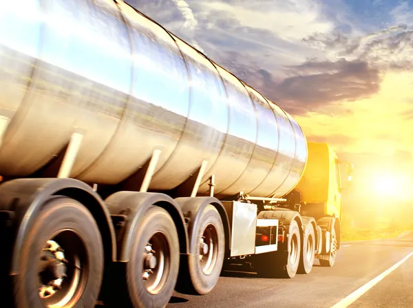 Truck on blurry asphalt road — Stock Photo, Image