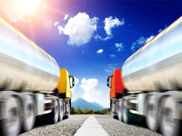 Big trucks on the asphalt road — Stock Photo, Image