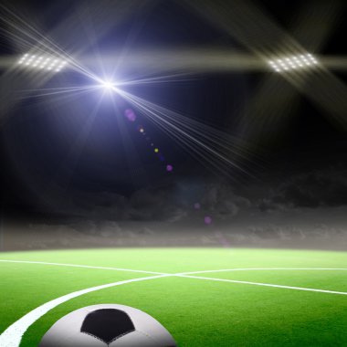 Parlak ışıkları olan futbol stadyumu
