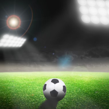 Parlak ışıkları olan futbol stadyumu
