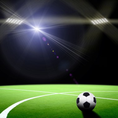 Parlak ışıkları olan futbol stadyumu