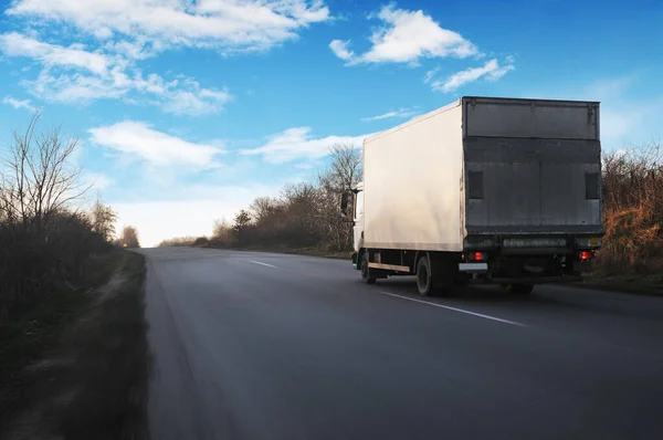 White Box Truck Driving Fast Countryside Asphalt Road Trees Blue Stock Picture