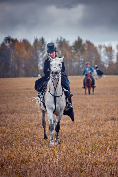 Horse-hunting with ladies in riding habit