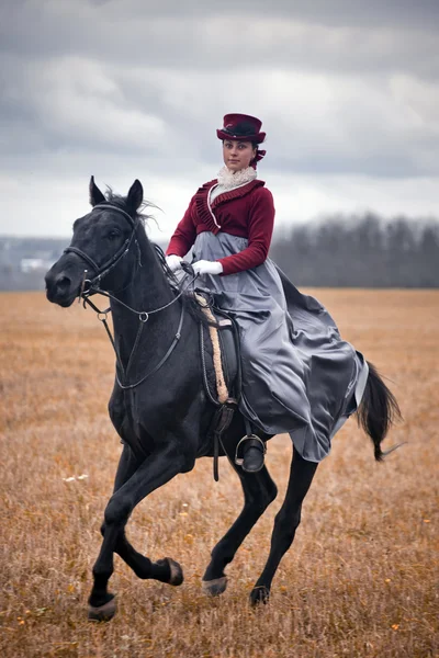 Pferdejagd mit Damen in Reiterkleidung — Stockfoto