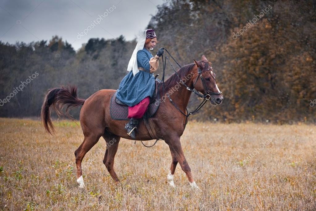 Horsehunting with ladies in riding habit Stock Editorial Photo