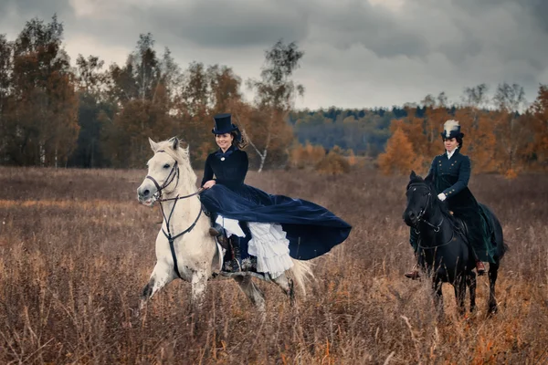 Koně lov s dámami v jezdeckým — Stock fotografie