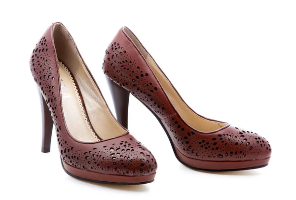 Hnědá, dámská obuv na bílém pozadí — Stock fotografie
