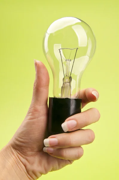 Hand mit Lampe — Stockfoto