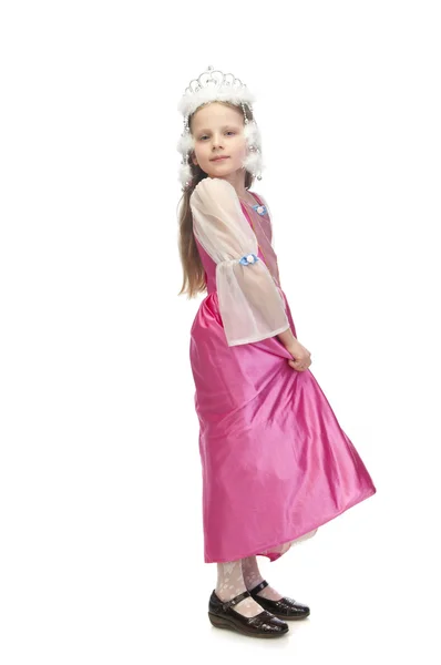 Schattig meisje in roze jurk — Stockfoto