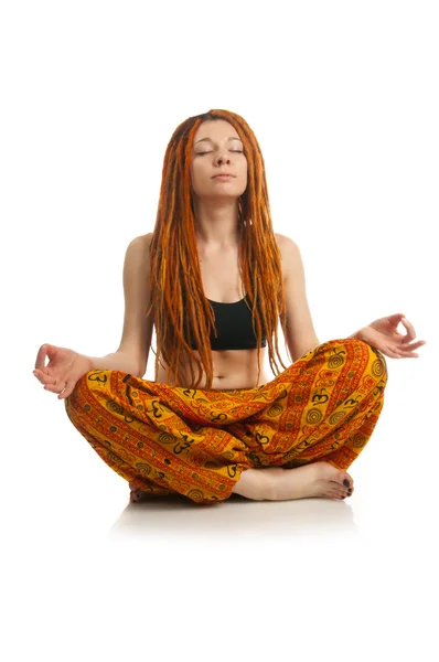 Girl with red dreadlocks meditating — Stock Photo, Image