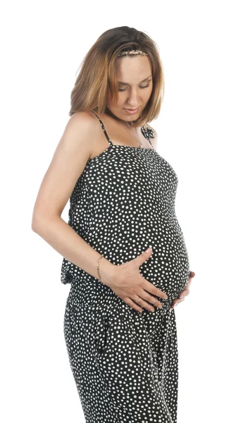 Pregnant woman touching her belly with hands — Stock Photo, Image