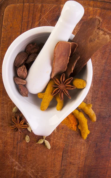 Mortar with dried spices — Stock Photo, Image