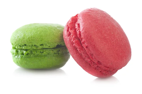Two green and red French macarons — Stock Photo, Image