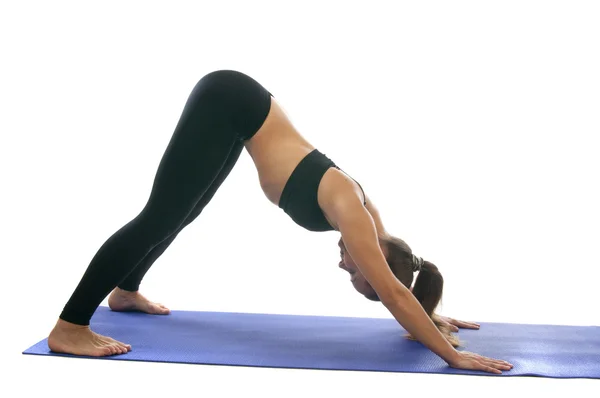 Adho mukha svanasana — Stockfoto