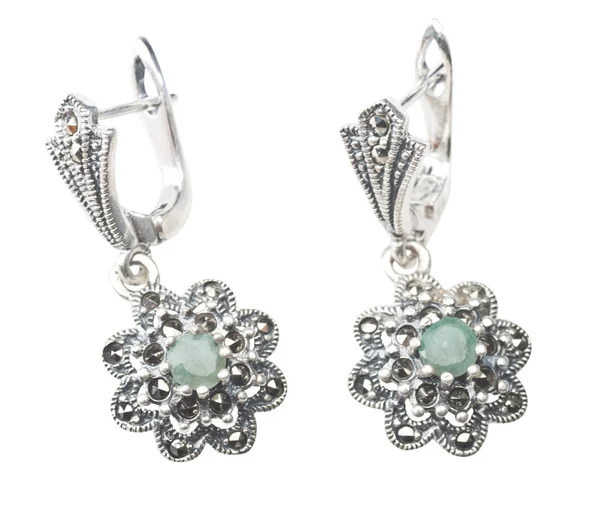 Silver earrings with emerald gemstone — Stock Photo, Image