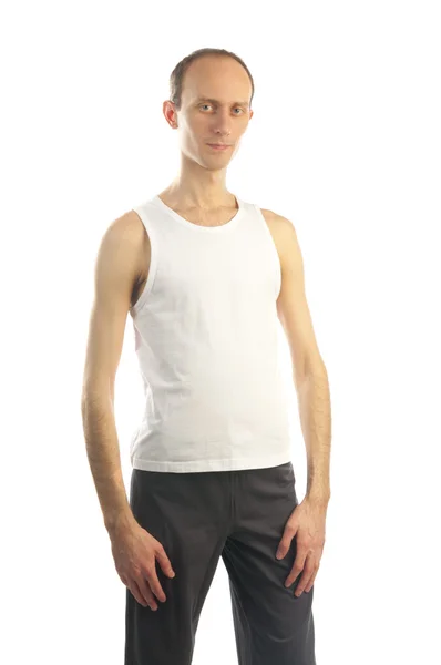 Худый высокий мужчина в белой футболке — стоковое фото