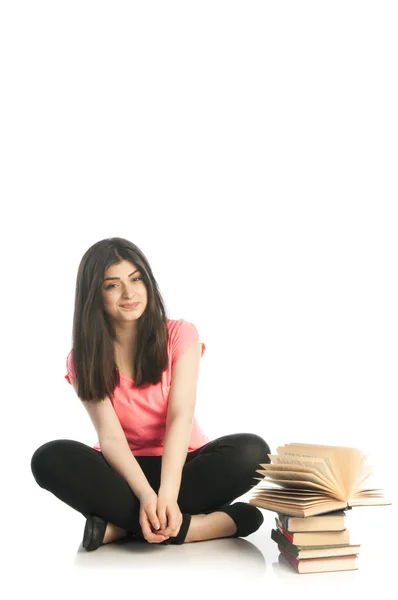 Joven morena con libros — Foto de Stock