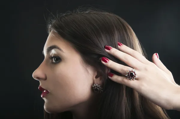 Beautiful woman with silver garnets accessories — Stock Photo, Image