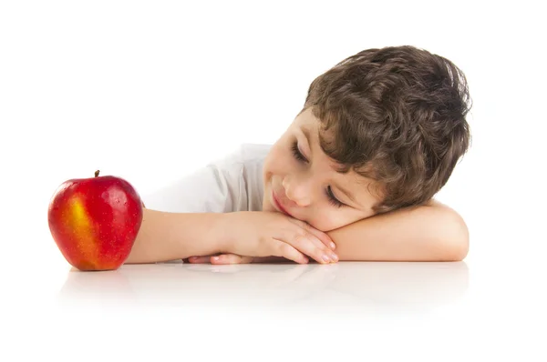 Durmiendo chico con una manzana —  Fotos de Stock