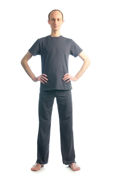 Magas vékony férfi kezét a csípő — Stock Fotó