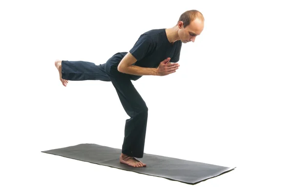 Man in Virabhadrasana position — Stock Photo, Image